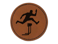 Man Jumping Over Hurdles Fitness Track and Field Round Iron-On Engraved Faux Leather Patch Applique - 2.5"