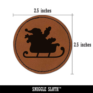 Santa in Sleigh Silhouette Christmas Round Iron-On Engraved Faux Leather Patch Applique - 2.5"