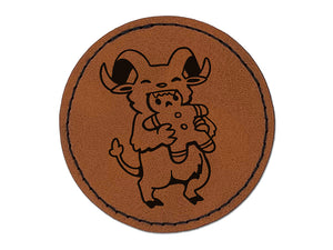 Krampus Gnawing on Gingerbread Man Cookie Christmas Round Iron-On Engraved Faux Leather Patch Applique - 2.5"